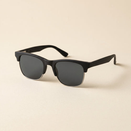 The Brow in Matte Black polarized sunglasses, front three-quarter view